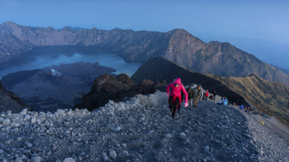 MOUNT RINJANI, LOMBOK, INDONESIA - SEPT 19, 2016 : Unidentified mountaineers hike on their way to the peak. Rinjani mountain is one of the highest and prettiest mountains in Indonesia