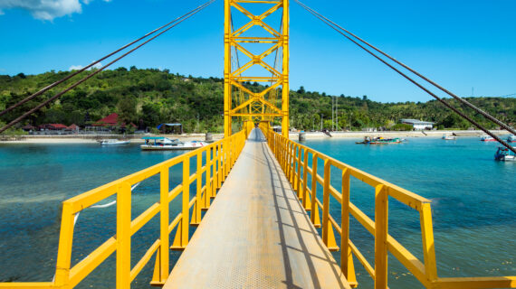 Yellow bridge between the islands of Nusa Cheningan and Nusa Lembongan, near Bali in Indonesia